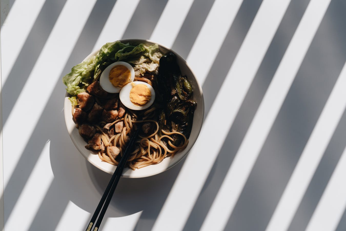 Classic ramen bowl with egg and meat - top Osaka ramen shops