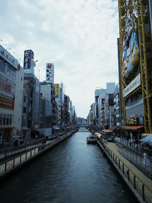 Osaka trip cost - the vibrant Dotonbori district where budget-friendly street food and entertainment await visitors