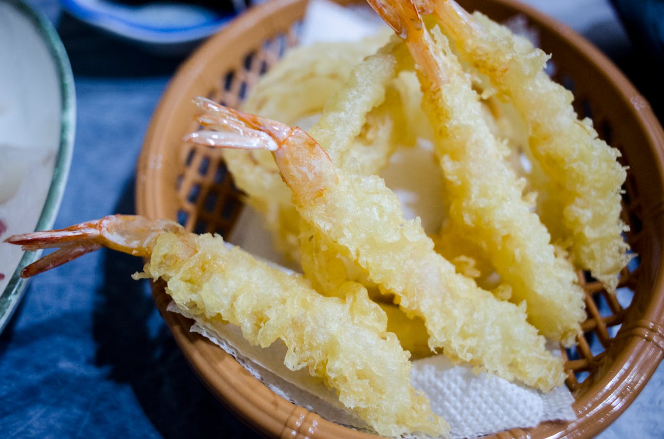 Deep-fried crispy food in basket - kushikatsu Osaka style