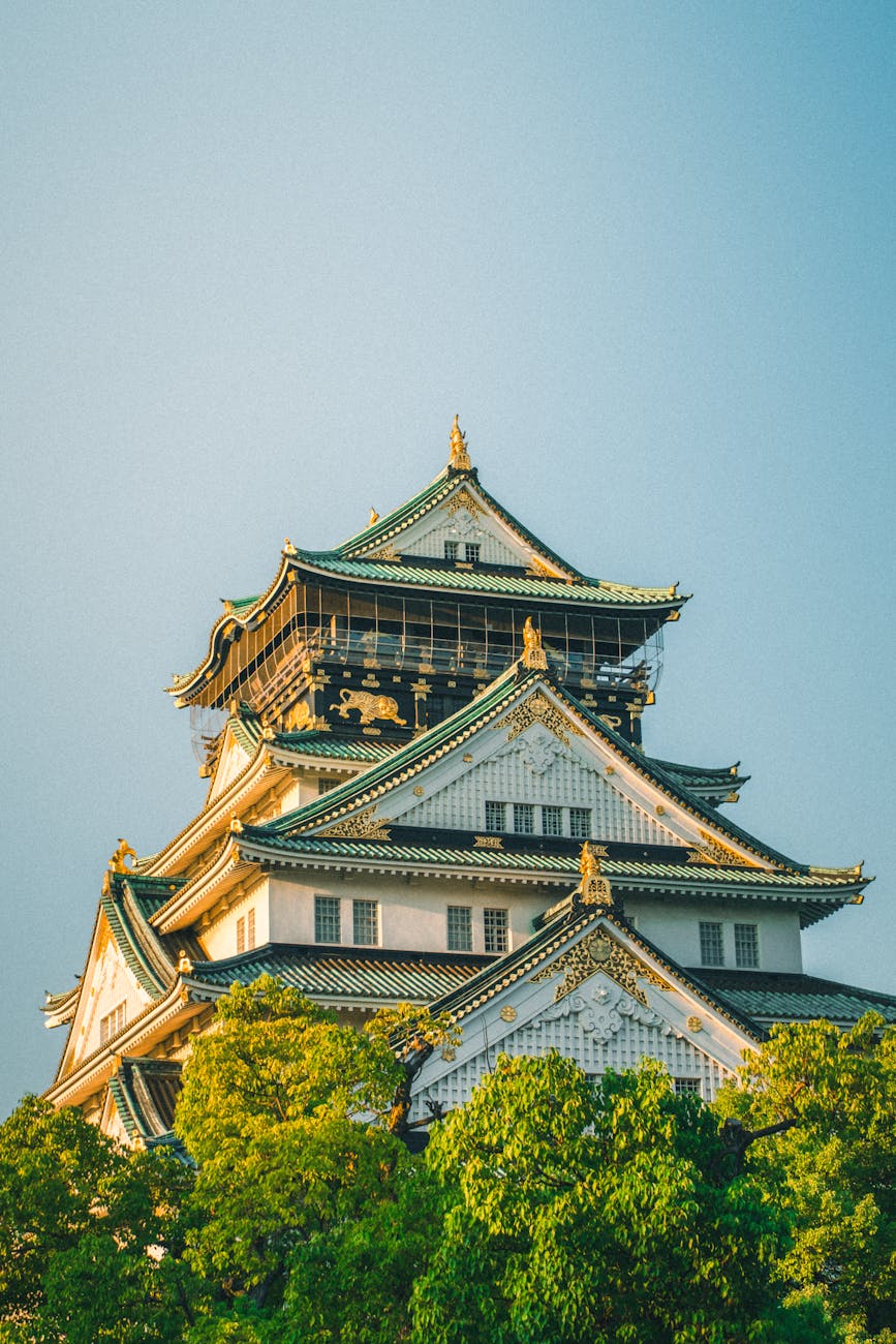 Osaka Castle surrounded by greenery - historical landmark among Osaka temples and shrines