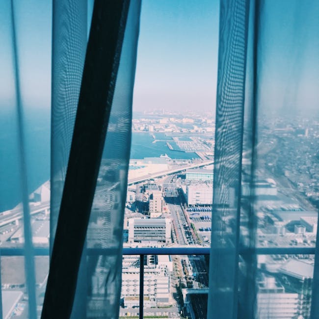 Osaka accommodation costs - city view from an Osaka hotel room showing the urban landscape
