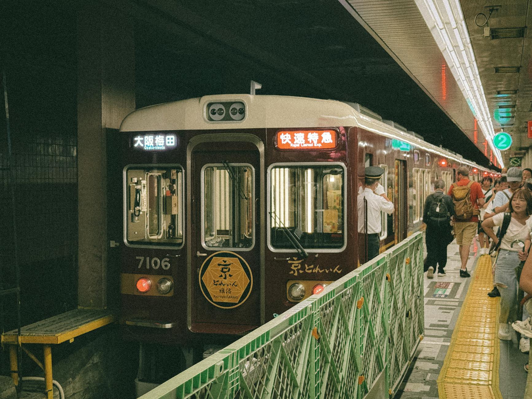Osaka train station platform - saving on transport during Osaka budget travel