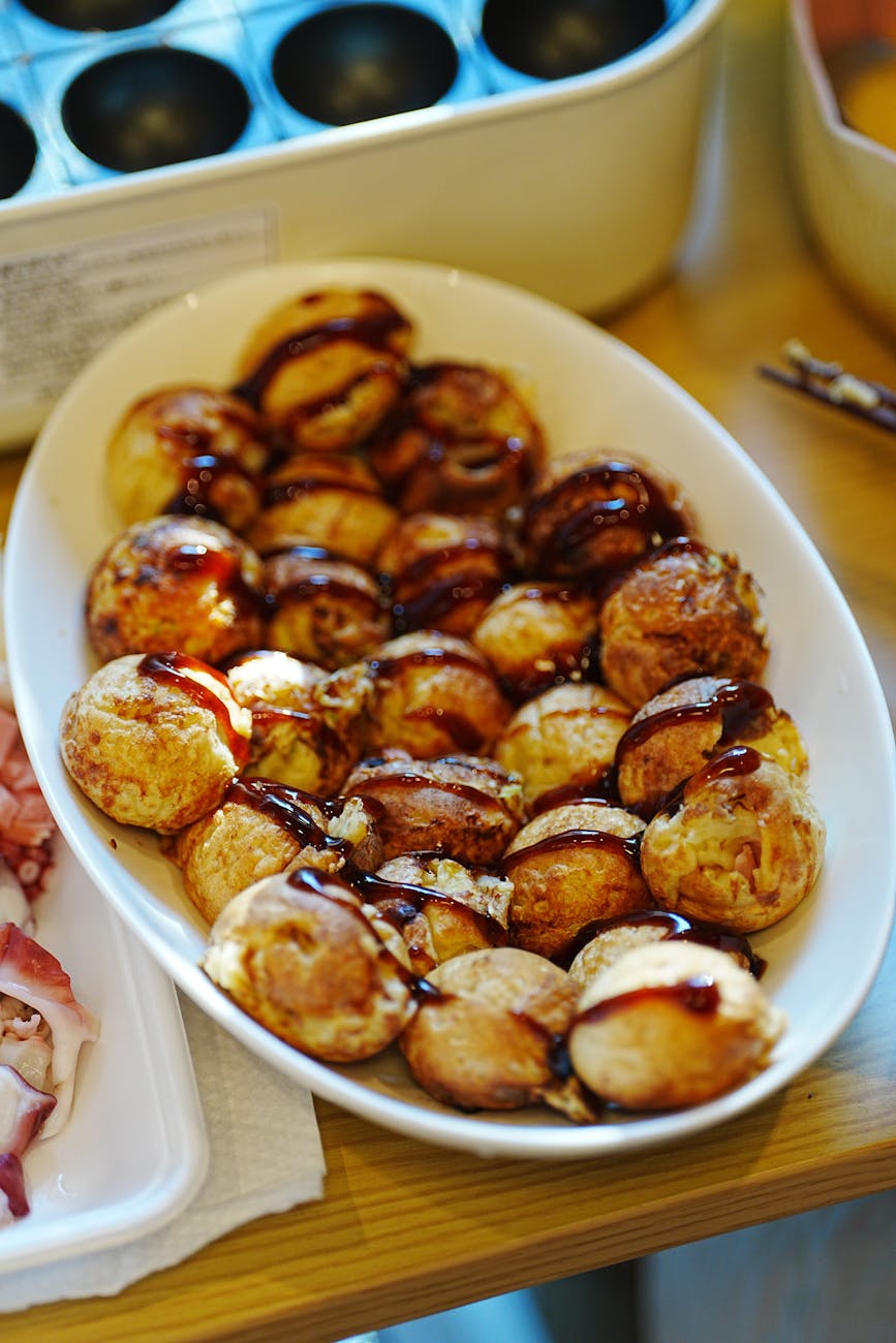 Freshly made takoyaki with sauce in Osaka - cheap eats for Osaka budget travel