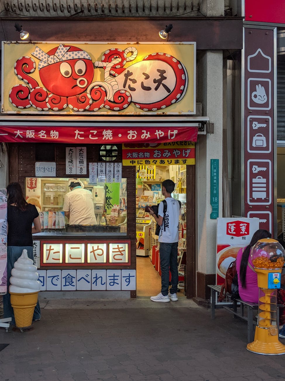 Takoyaki street food stall in Osaka - affordable Osaka budget travel eats