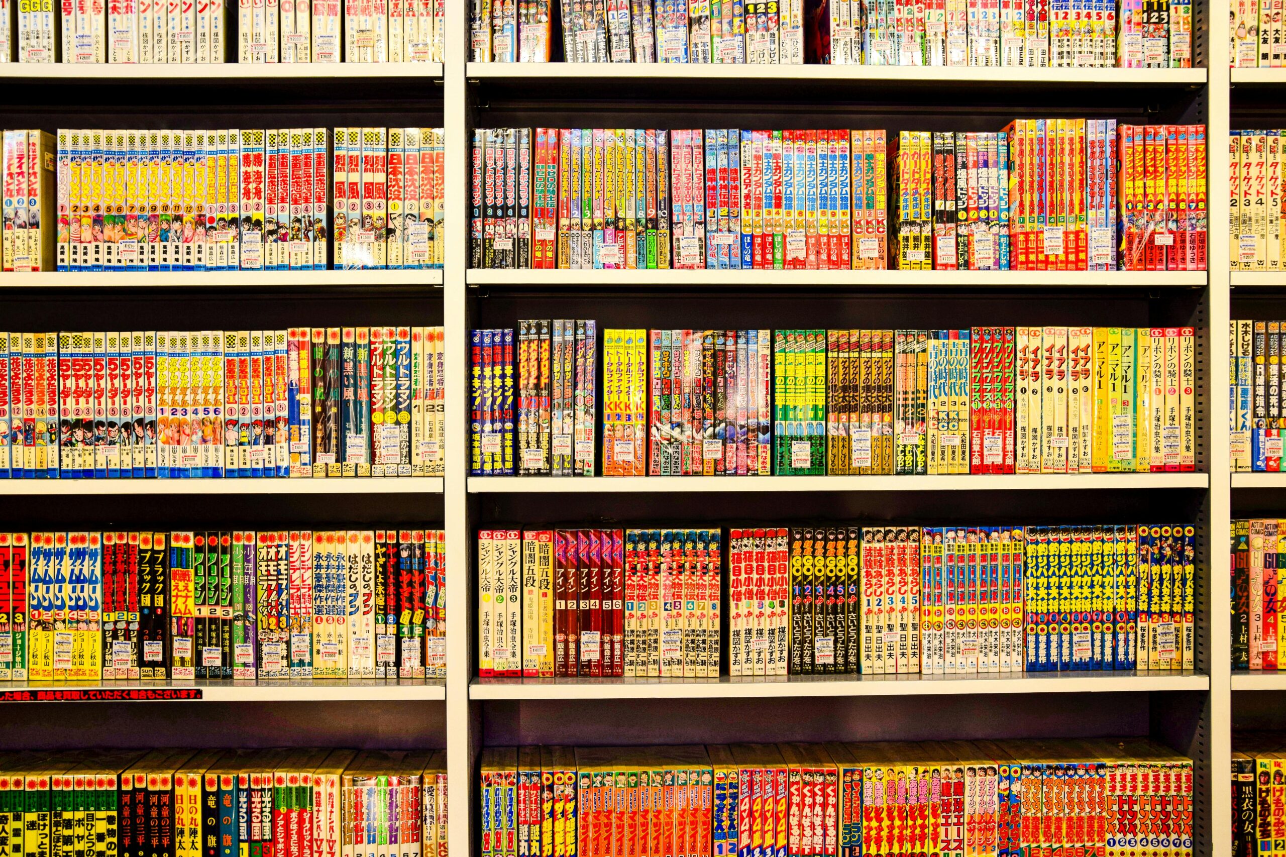 Shelves stacked with Japanese manga in a Den Den Town bookstore