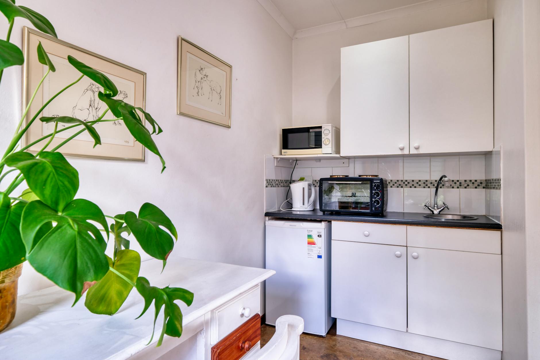 An equipped kitchenette in an Osaka Airbnb apartment rental