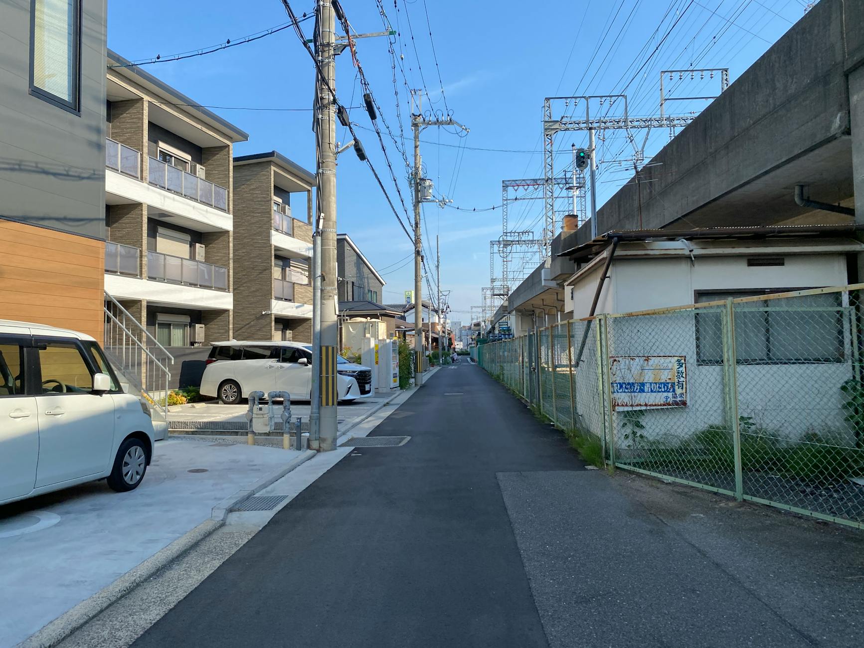 A residential apartment street in an Osaka neighborhood popular for Airbnb stays