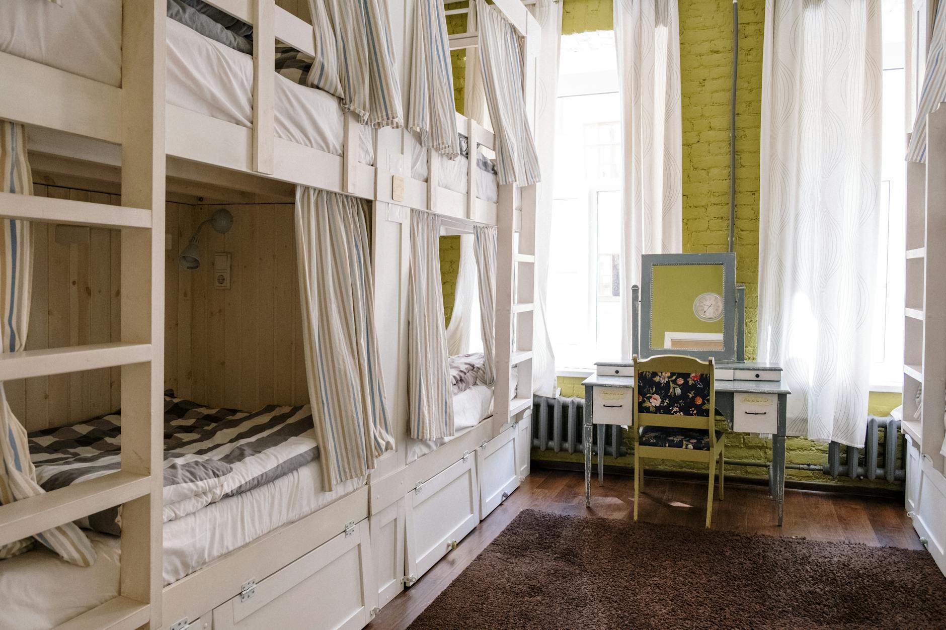Clean dormitory bunk beds at a budget hostel in Osaka