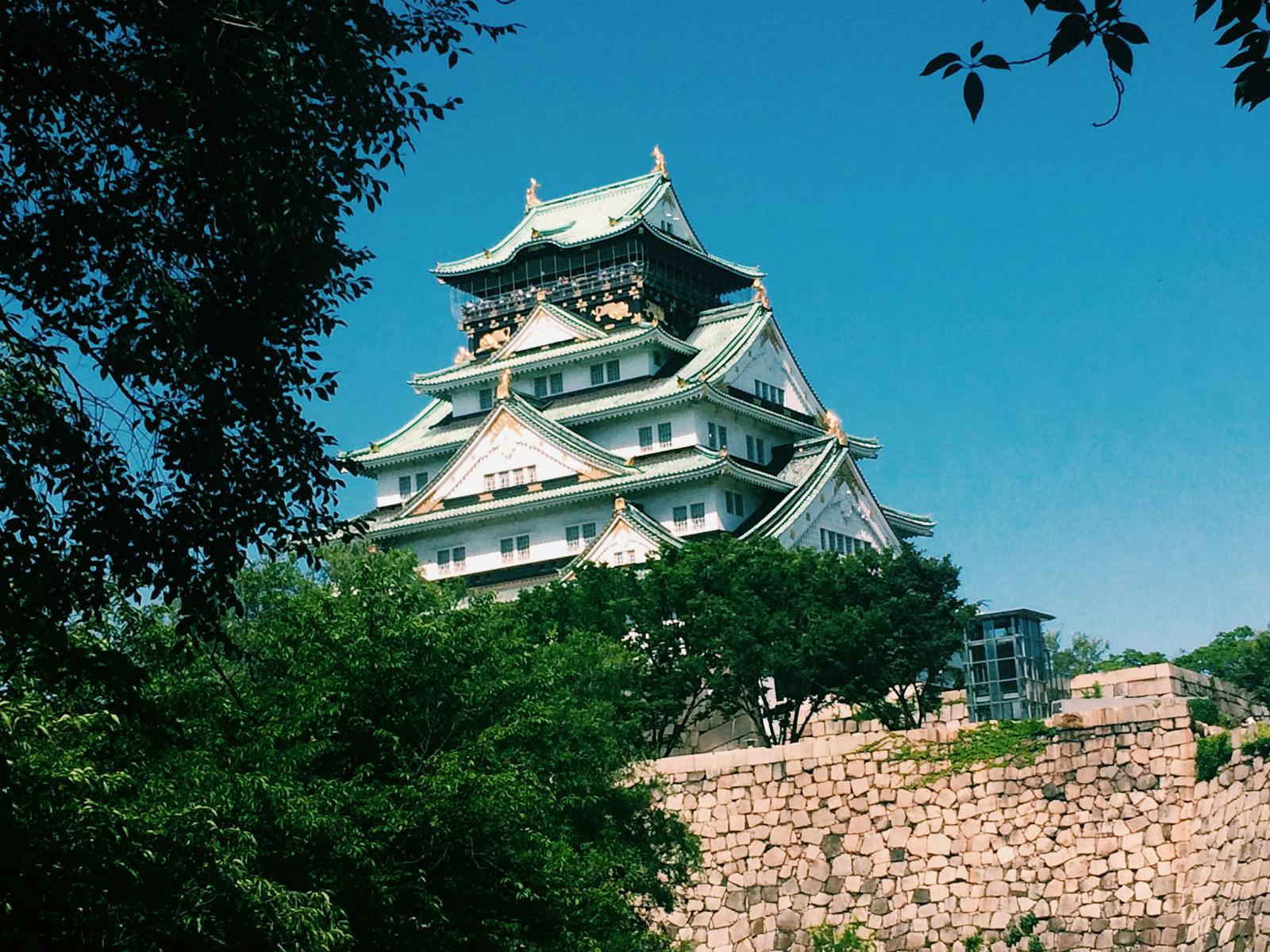 Osaka Castle in greenery, near the quieter family hotels of Osaka