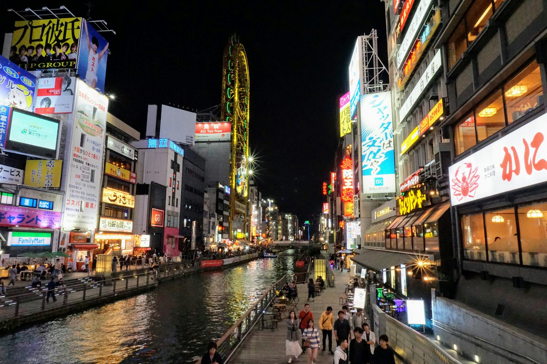 Dotonbori canal lit up at night, one of the best free things to do in Osaka