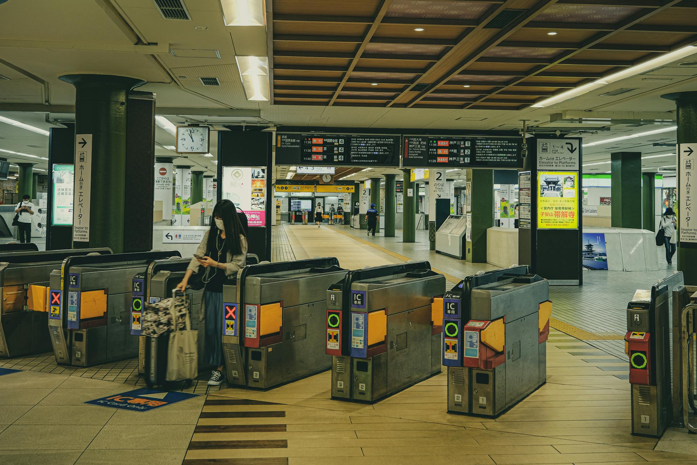 Ticket gates at a Japanese railway station where you tap an ICOCA card to enter