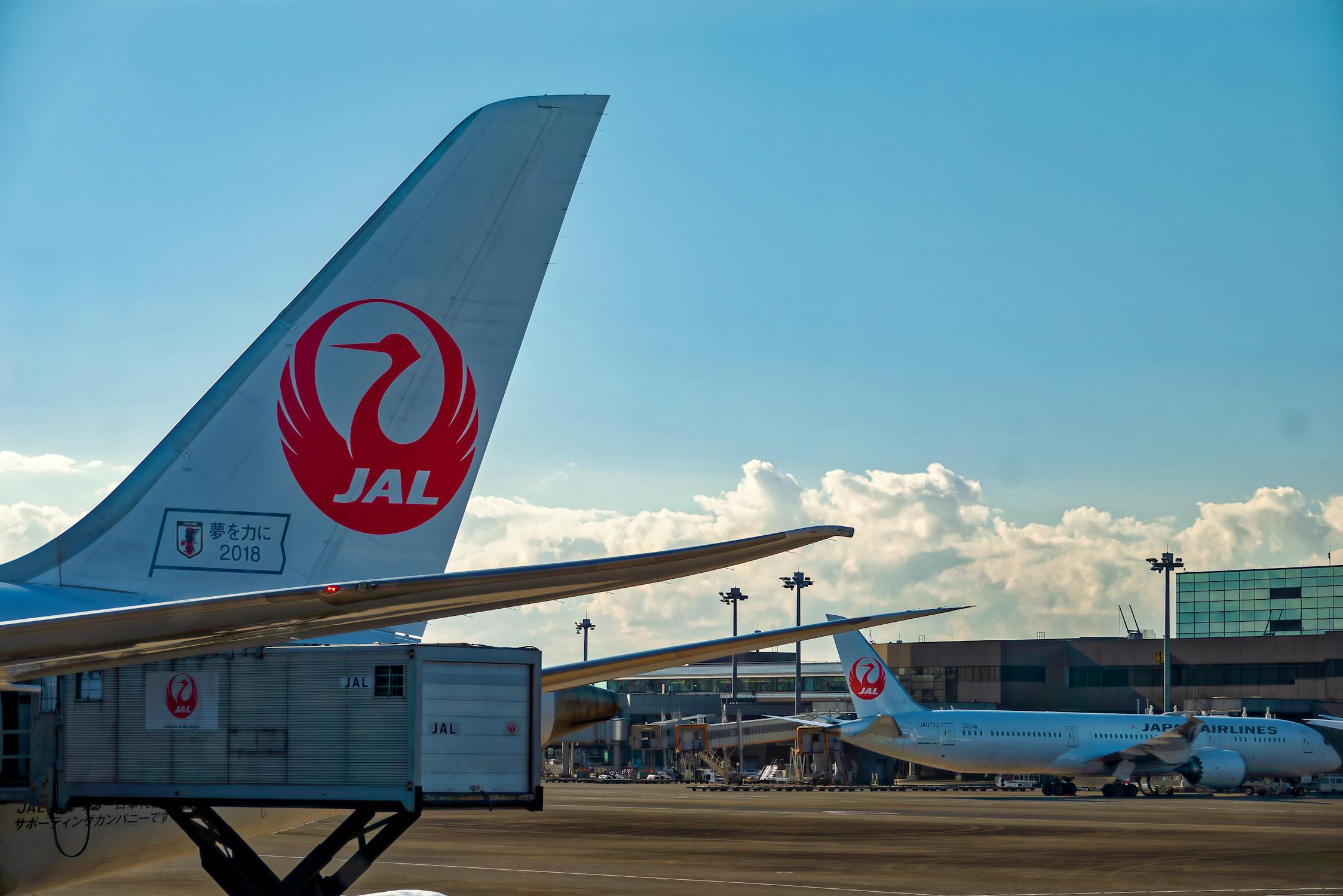 Aircraft on the tarmac at a Japanese airport, where most flights to Osaka arrive