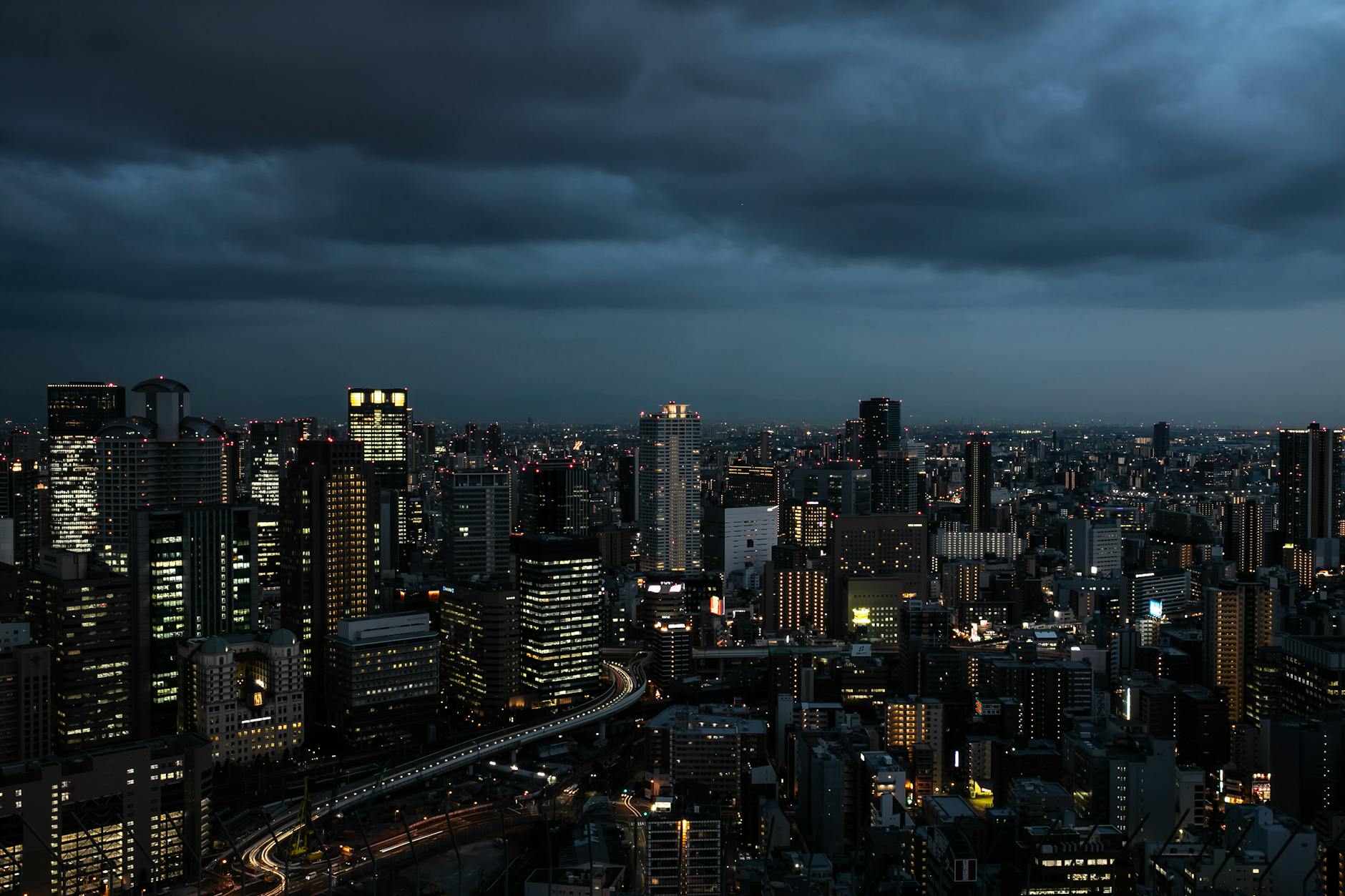 Osaka skyline at twilight seen from a luxury hotel high floor