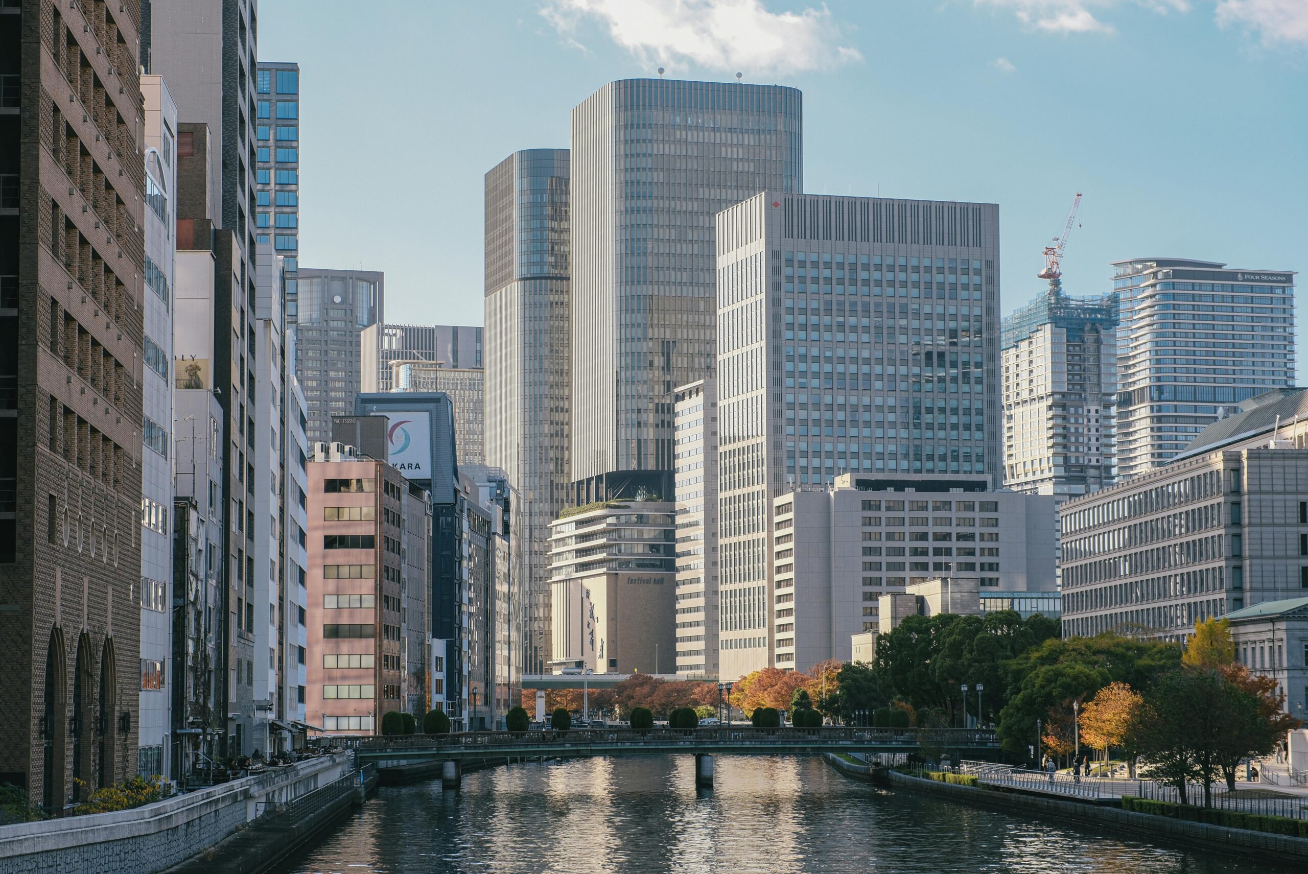 Skyscrapers and a quiet river running through central Osaka near Nakanoshima