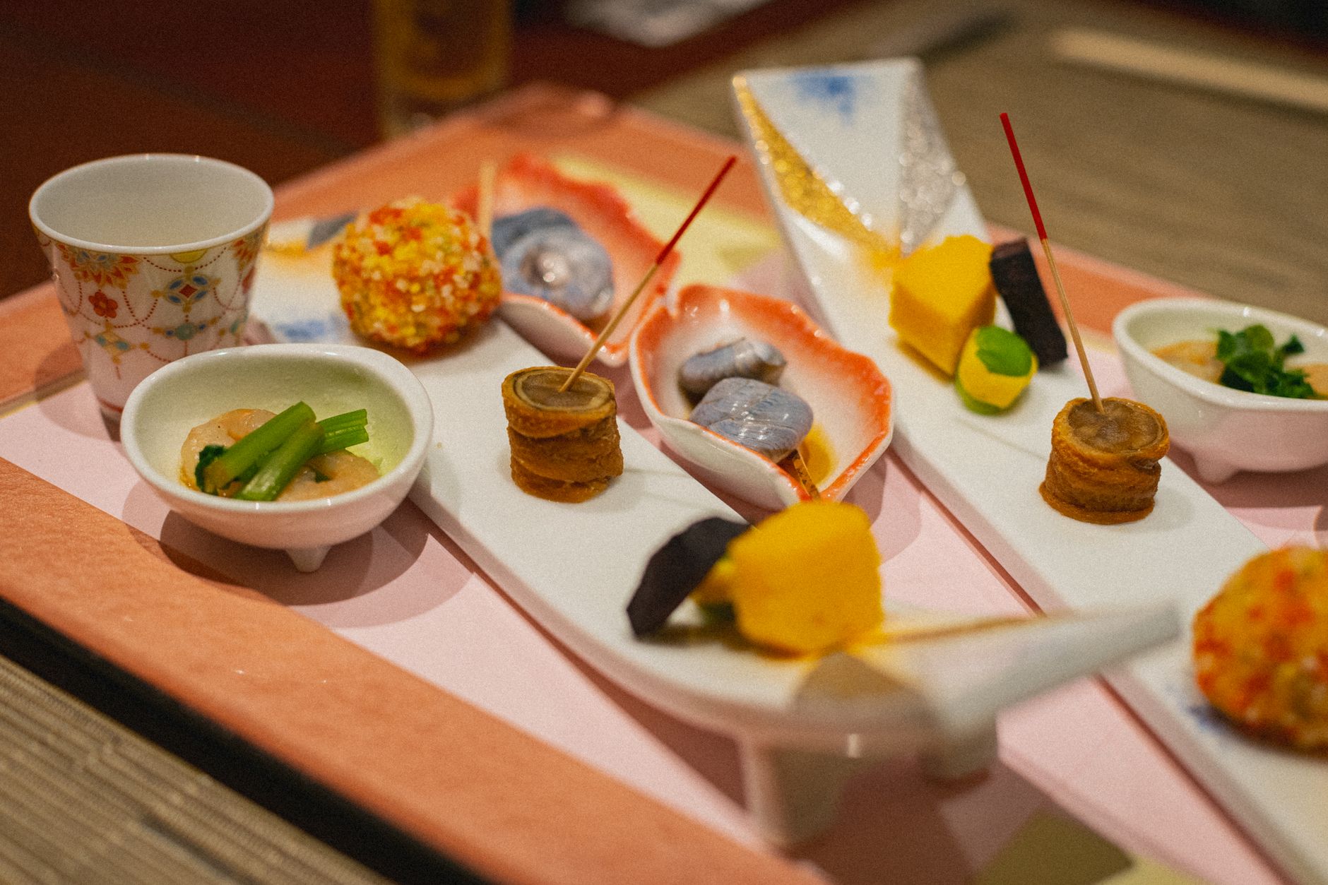A kaiseki multi-course dinner beautifully arranged, the format of many Michelin Osaka restaurants
