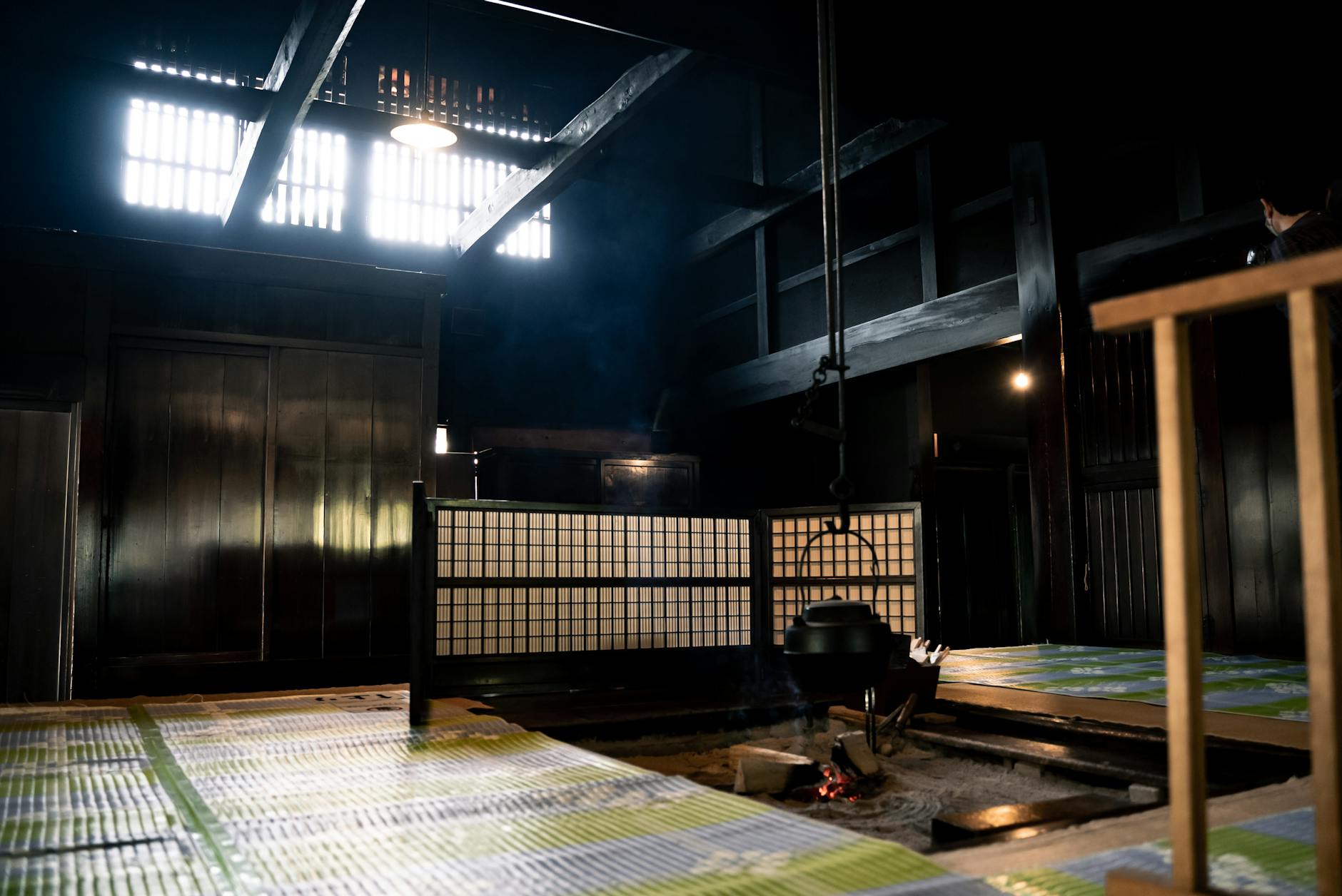 Traditional Japanese ryokan interior with sunken hearth near Osaka
