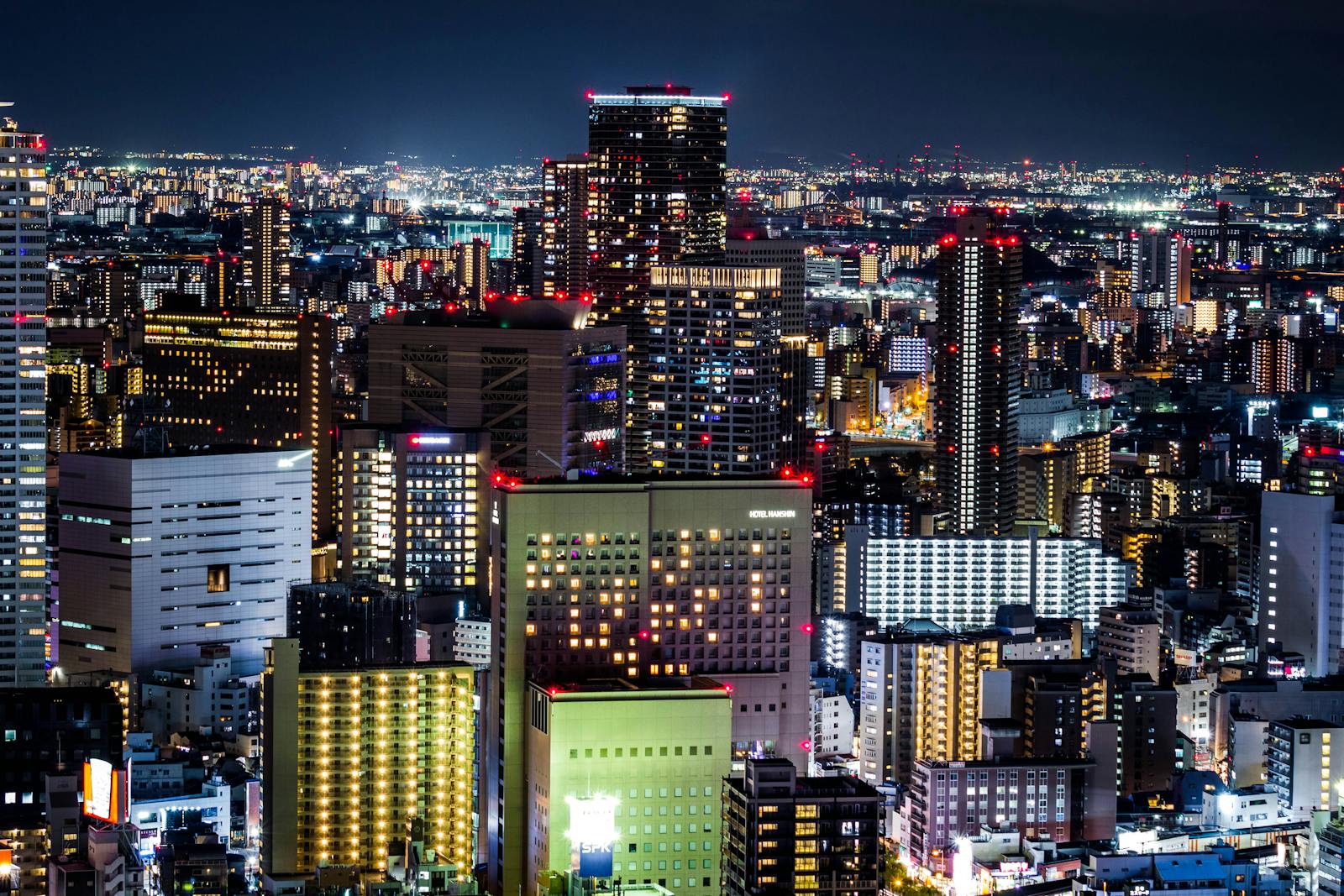 The Osaka skyline at night seen from the Umeda district