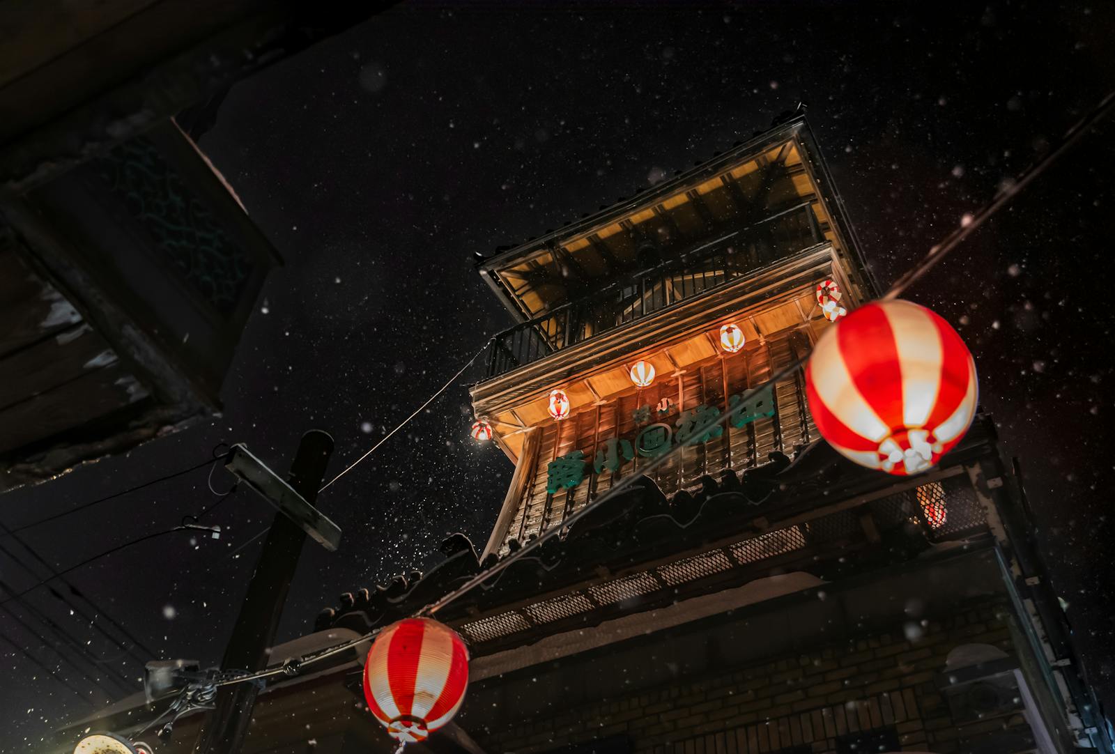 Winter lanterns and lights glowing at night during the Osaka illuminations season
