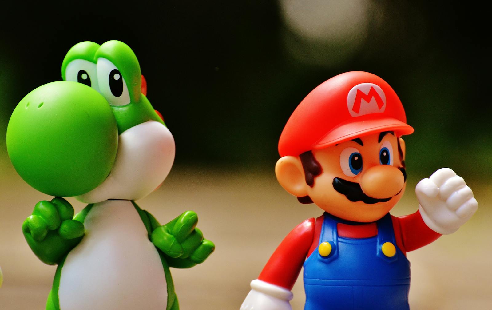 Mario and Yoshi figures representing Super Nintendo World at Universal Studios Japan Osaka