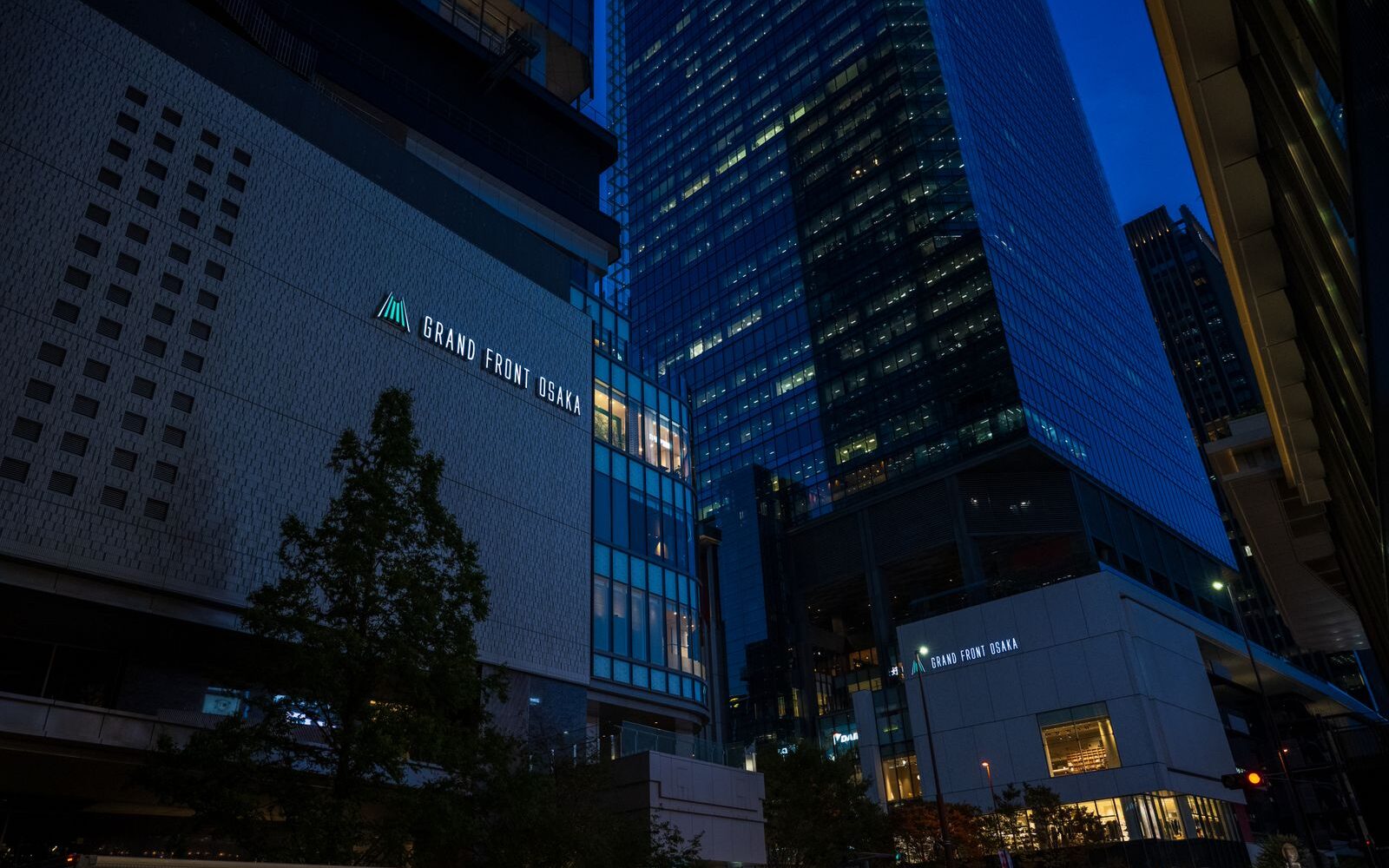 Grand Front Osaka's towers at dusk on the north side of Osaka Station
