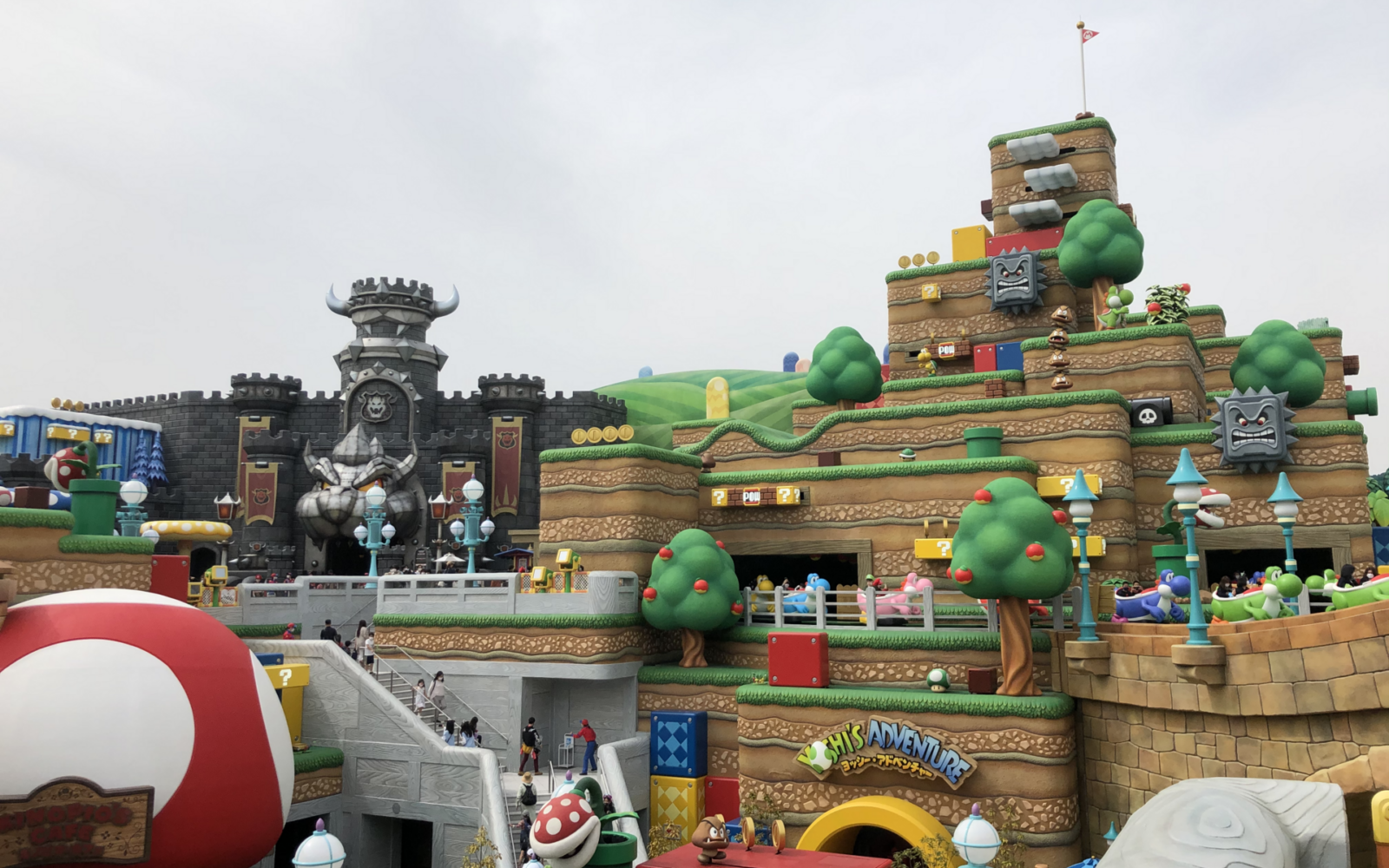 Colorful Mushroom Kingdom terraces, Yoshi vehicles and Bowser's Castle fill Super Nintendo World at Universal Studios Japan in Osaka.